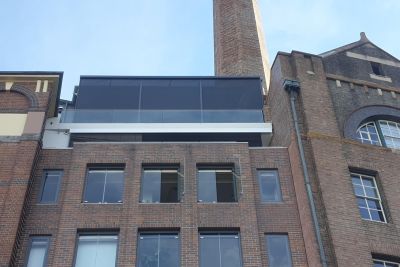 ZIP screen covering the outdoor area of an upstairs property