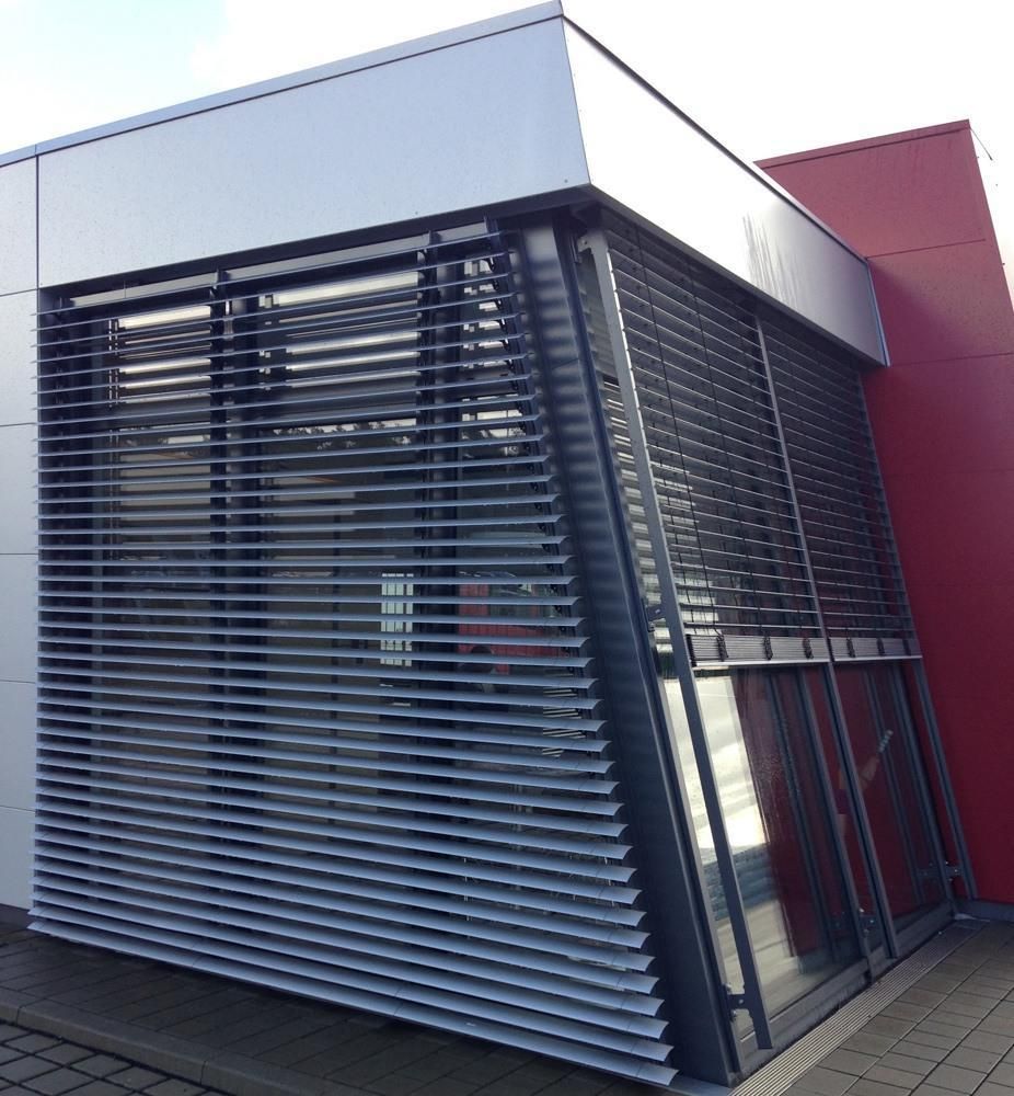 Rack Arm Louvres on windows of a building