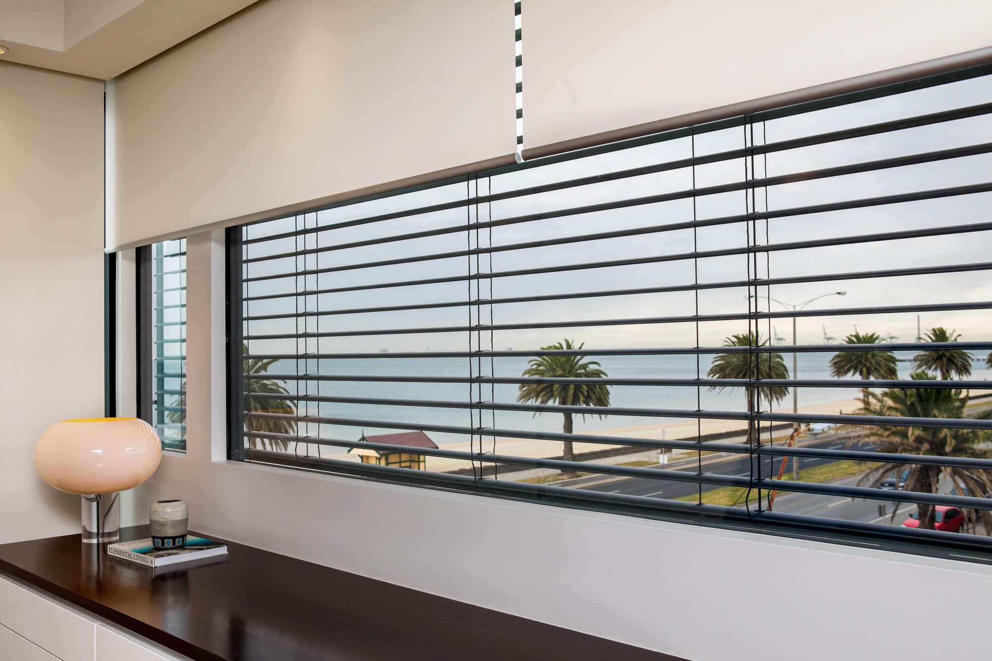 Internal roller blinds combined with external venetian blinds