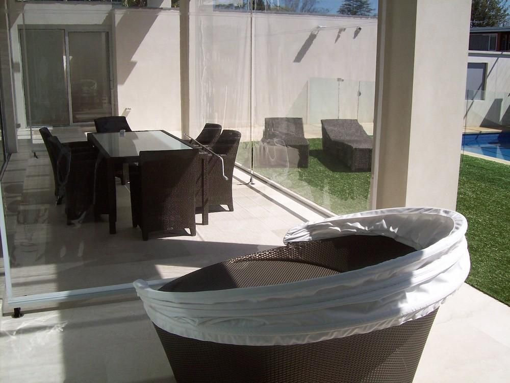 Internal view of vertical awnings retracted on a residential house